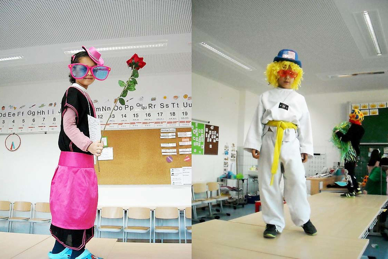 Schülerin und Schüler in Faschingskostümen