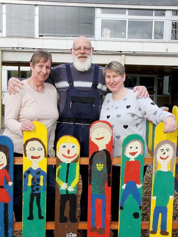 Hausmeister mit Reinigungsfrauen